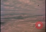Image of aerial view distant atom bomb explosion Nevada United States USA , 1958, second 5 stock footage video 65675078692
