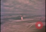Image of aerial view distant atom bomb explosion Nevada United States USA , 1958, second 13 stock footage video 65675078692