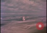 Image of aerial view distant atom bomb explosion Nevada United States USA , 1958, second 23 stock footage video 65675078692