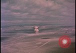 Image of aerial view distant atom bomb explosion Nevada United States USA , 1958, second 24 stock footage video 65675078692