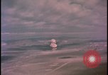 Image of aerial view distant atom bomb explosion Nevada United States USA , 1958, second 28 stock footage video 65675078692
