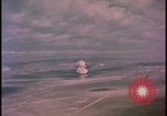 Image of aerial view distant atom bomb explosion Nevada United States USA , 1958, second 29 stock footage video 65675078692
