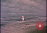 Image of aerial view distant atom bomb explosion Nevada United States USA , 1958, second 30 stock footage video 65675078692
