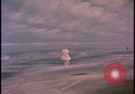 Image of aerial view distant atom bomb explosion Nevada United States USA , 1958, second 33 stock footage video 65675078692