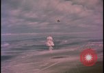 Image of aerial view distant atom bomb explosion Nevada United States USA , 1958, second 38 stock footage video 65675078692