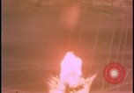 Image of two atomic bomb mushroom clouds Nevada United States USA , 1958, second 8 stock footage video 65675078693