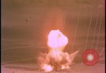 Image of two atomic bomb mushroom clouds Nevada United States USA , 1958, second 10 stock footage video 65675078693