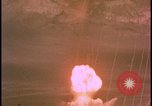 Image of two atomic bomb mushroom clouds Nevada United States USA , 1958, second 11 stock footage video 65675078693