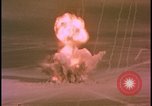 Image of two atomic bomb mushroom clouds Nevada United States USA , 1958, second 13 stock footage video 65675078693