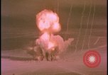 Image of two atomic bomb mushroom clouds Nevada United States USA , 1958, second 14 stock footage video 65675078693