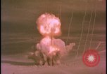 Image of two atomic bomb mushroom clouds Nevada United States USA , 1958, second 15 stock footage video 65675078693