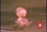 Image of two atomic bomb mushroom clouds Nevada United States USA , 1958, second 16 stock footage video 65675078693