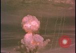 Image of two atomic bomb mushroom clouds Nevada United States USA , 1958, second 17 stock footage video 65675078693