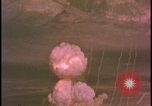 Image of two atomic bomb mushroom clouds Nevada United States USA , 1958, second 18 stock footage video 65675078693