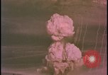 Image of two atomic bomb mushroom clouds Nevada United States USA , 1958, second 21 stock footage video 65675078693