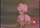 Image of two atomic bomb mushroom clouds Nevada United States USA , 1958, second 22 stock footage video 65675078693