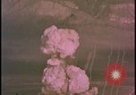Image of two atomic bomb mushroom clouds Nevada United States USA , 1958, second 25 stock footage video 65675078693