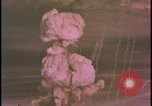 Image of two atomic bomb mushroom clouds Nevada United States USA , 1958, second 26 stock footage video 65675078693