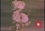 Image of two atomic bomb mushroom clouds Nevada United States USA , 1958, second 27 stock footage video 65675078693