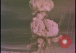 Image of two atomic bomb mushroom clouds Nevada United States USA , 1958, second 29 stock footage video 65675078693