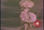 Image of two atomic bomb mushroom clouds Nevada United States USA , 1958, second 30 stock footage video 65675078693