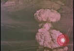 Image of two atomic bomb mushroom clouds Nevada United States USA , 1958, second 31 stock footage video 65675078693
