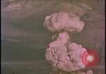 Image of two atomic bomb mushroom clouds Nevada United States USA , 1958, second 33 stock footage video 65675078693
