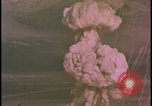 Image of two atomic bomb mushroom clouds Nevada United States USA , 1958, second 34 stock footage video 65675078693