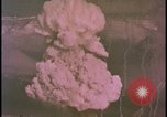 Image of two atomic bomb mushroom clouds Nevada United States USA , 1958, second 38 stock footage video 65675078693