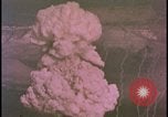 Image of two atomic bomb mushroom clouds Nevada United States USA , 1958, second 39 stock footage video 65675078693