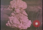 Image of two atomic bomb mushroom clouds Nevada United States USA , 1958, second 40 stock footage video 65675078693