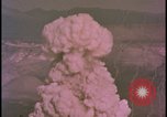 Image of two atomic bomb mushroom clouds Nevada United States USA , 1958, second 42 stock footage video 65675078693