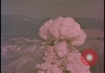 Image of two atomic bomb mushroom clouds Nevada United States USA , 1958, second 46 stock footage video 65675078693
