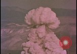 Image of two atomic bomb mushroom clouds Nevada United States USA , 1958, second 47 stock footage video 65675078693