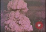 Image of two atomic bomb mushroom clouds Nevada United States USA , 1958, second 50 stock footage video 65675078693