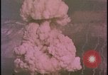 Image of two atomic bomb mushroom clouds Nevada United States USA , 1958, second 51 stock footage video 65675078693