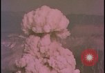 Image of two atomic bomb mushroom clouds Nevada United States USA , 1958, second 52 stock footage video 65675078693