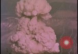 Image of two atomic bomb mushroom clouds Nevada United States USA , 1958, second 53 stock footage video 65675078693