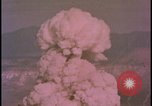 Image of two atomic bomb mushroom clouds Nevada United States USA , 1958, second 59 stock footage video 65675078693