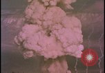 Image of two atomic bomb mushroom clouds Nevada United States USA , 1958, second 61 stock footage video 65675078693