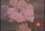 Image of two atomic bomb mushroom clouds Nevada United States USA , 1958, second 62 stock footage video 65675078693