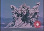 Image of underground atom bomb testing dust cloud Nevada United States USA , 1958, second 6 stock footage video 65675078695
