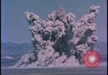 Image of underground atom bomb testing dust cloud Nevada United States USA , 1958, second 8 stock footage video 65675078695