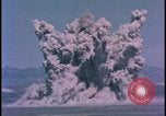 Image of underground atom bomb testing dust cloud Nevada United States USA , 1958, second 10 stock footage video 65675078695