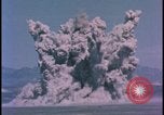 Image of underground atom bomb testing dust cloud Nevada United States USA , 1958, second 11 stock footage video 65675078695
