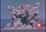 Image of underground atom bomb testing dust cloud Nevada United States USA , 1958, second 13 stock footage video 65675078695