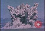Image of underground atom bomb testing dust cloud Nevada United States USA , 1958, second 14 stock footage video 65675078695