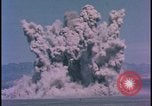 Image of underground atom bomb testing dust cloud Nevada United States USA , 1958, second 22 stock footage video 65675078695