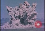 Image of underground atom bomb testing dust cloud Nevada United States USA , 1958, second 23 stock footage video 65675078695