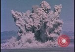 Image of underground atom bomb testing dust cloud Nevada United States USA , 1958, second 25 stock footage video 65675078695